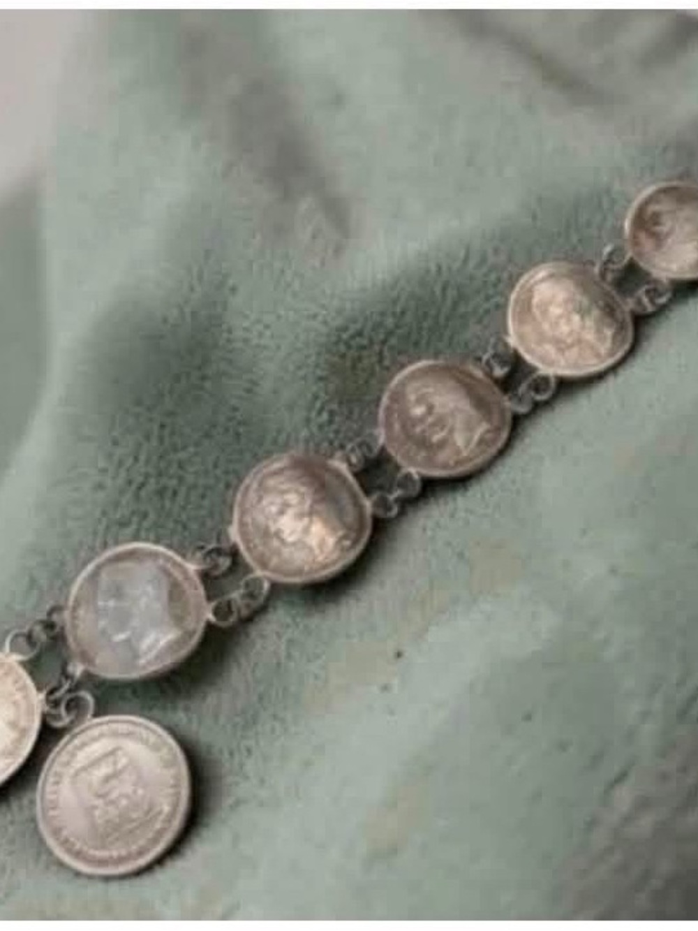 vintage-style bracelet is crafted from authentic Venezuelan 50 Céntimos coins